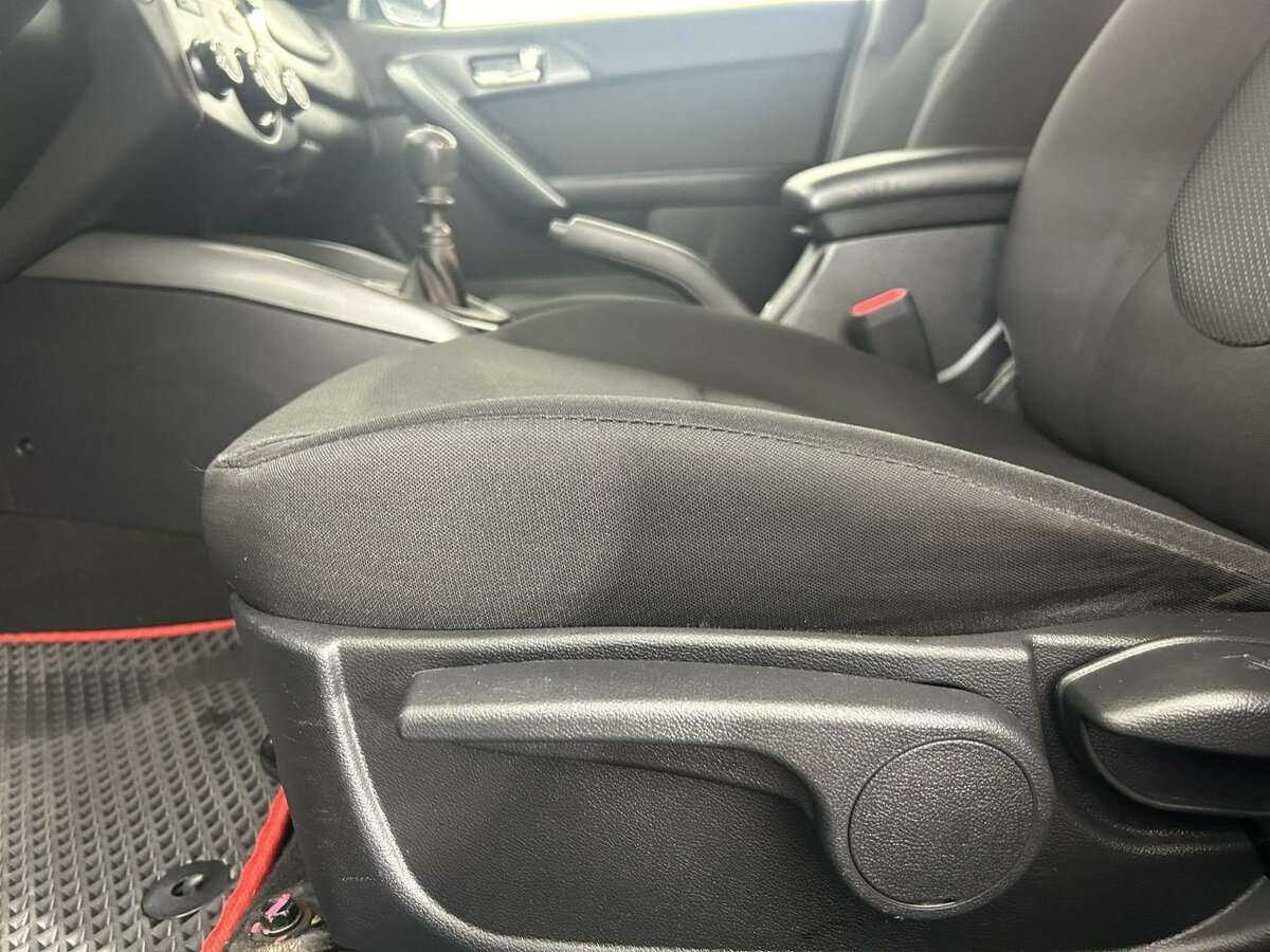Kia Cerato 2013 года с пробегом. Фото: #7