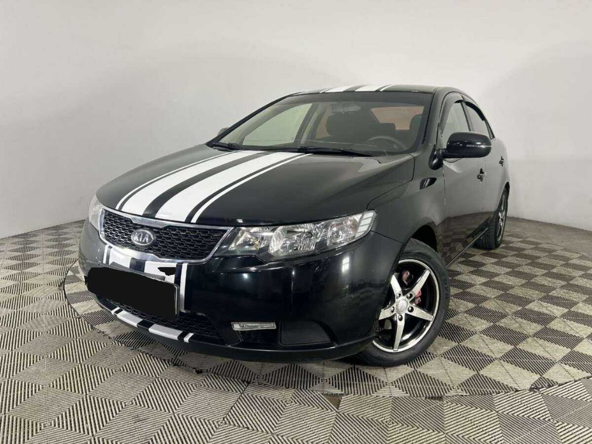 Kia Cerato 2013 года с пробегом. Фото: #0