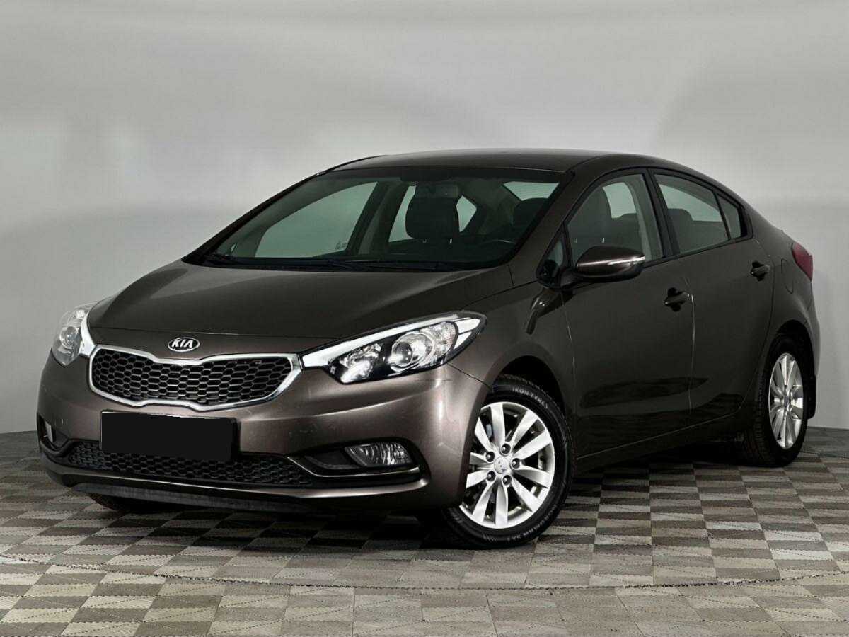 Kia Cerato 2014 года с пробегом. Посмотреть фото