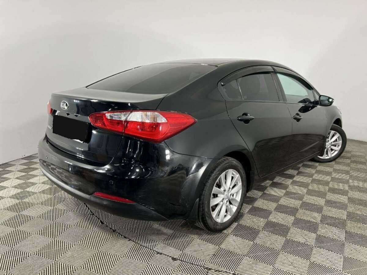 Kia Cerato 2014 года с пробегом. Фото: #5