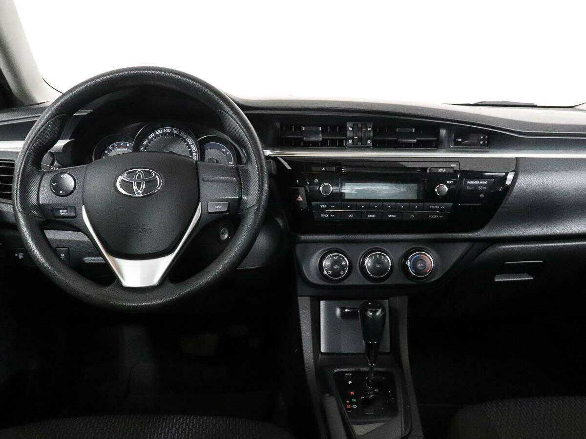 Б/У Тойота Королла 2013 года. Фото: #8