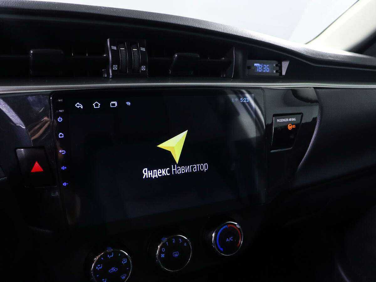 Б/У Тойота Королла 2013 года. Фото: #11