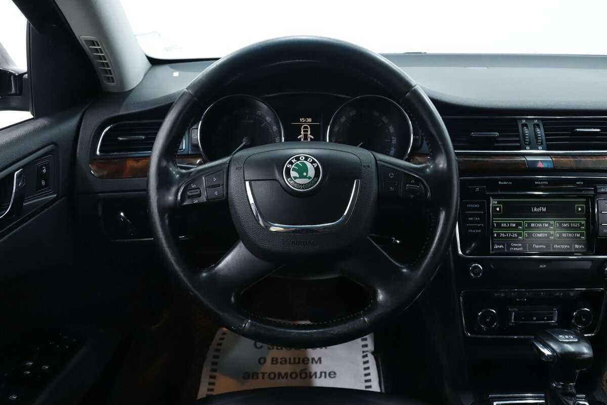 Б/У Шкода Суперб 2013 года. Фото: #11