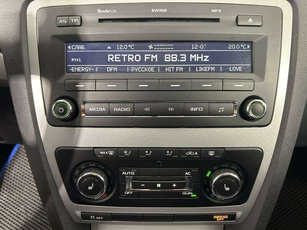 Б/У Шкода Октавия 2012 года. Фото: #11