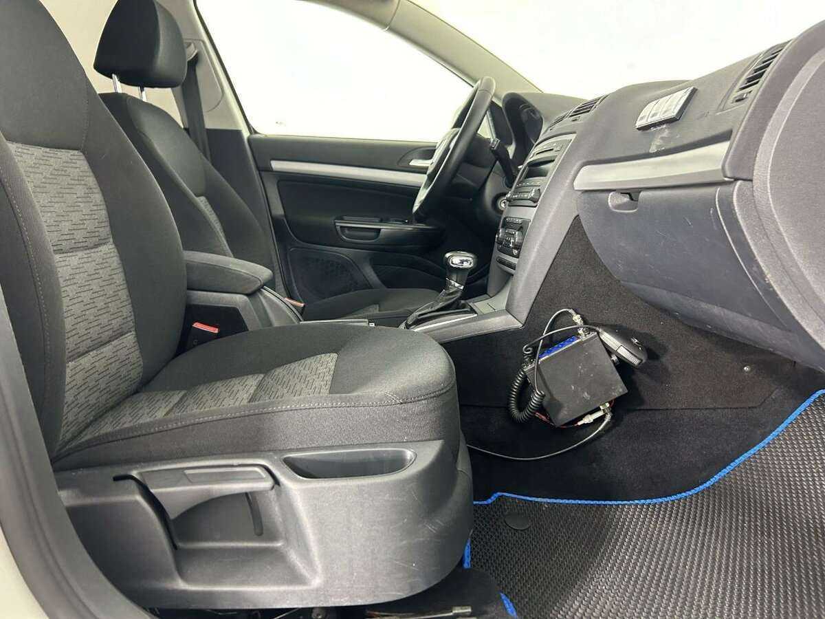 Б/У Шкода Октавия 2012 года. Фото: #13