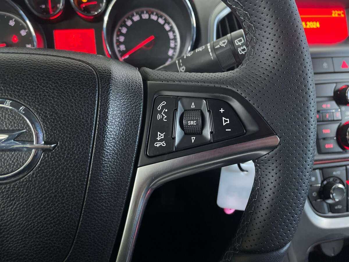 Б/У Опель Астра 2012 года. Фото: #11