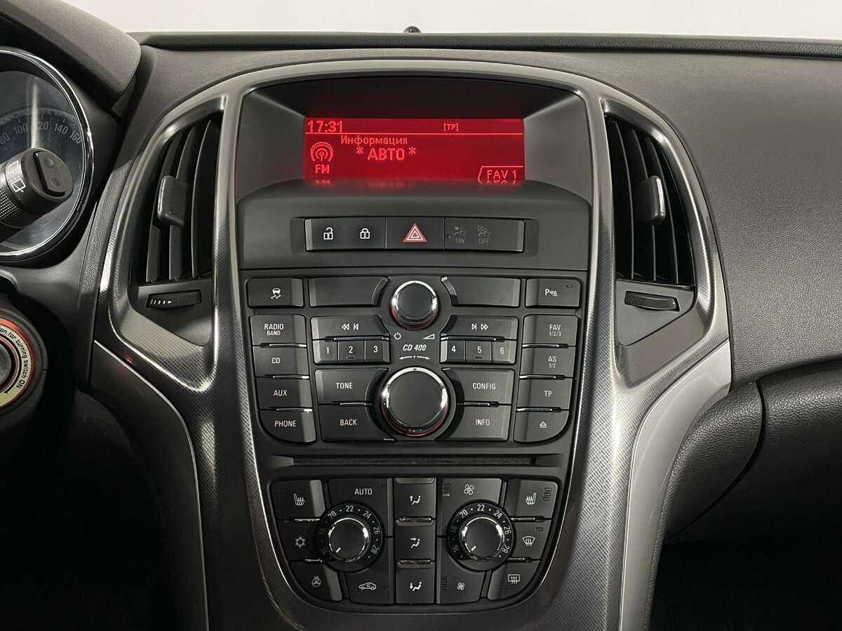 Б/У Опель Астра 2012 года. Фото: #11