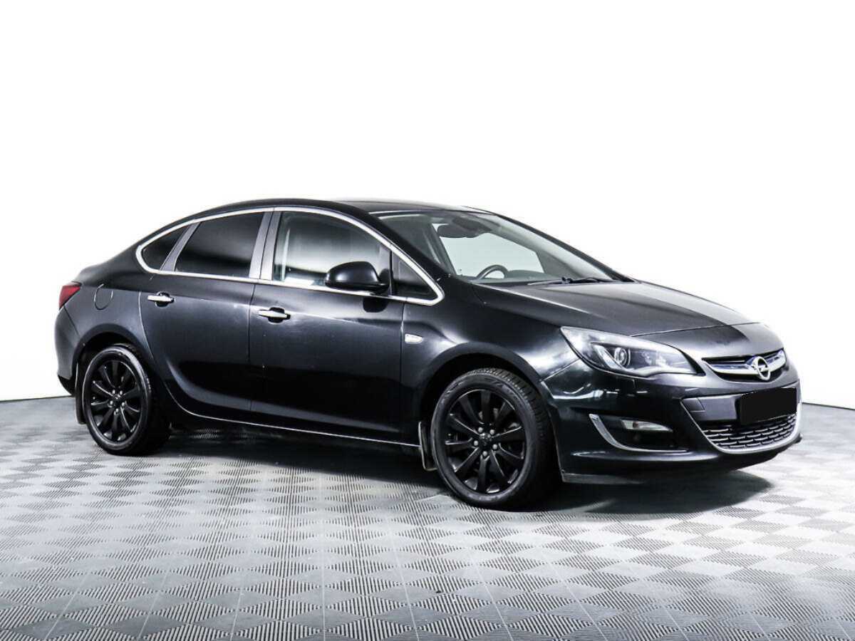 Б/У Опель Астра 2013 года. Фото: #1