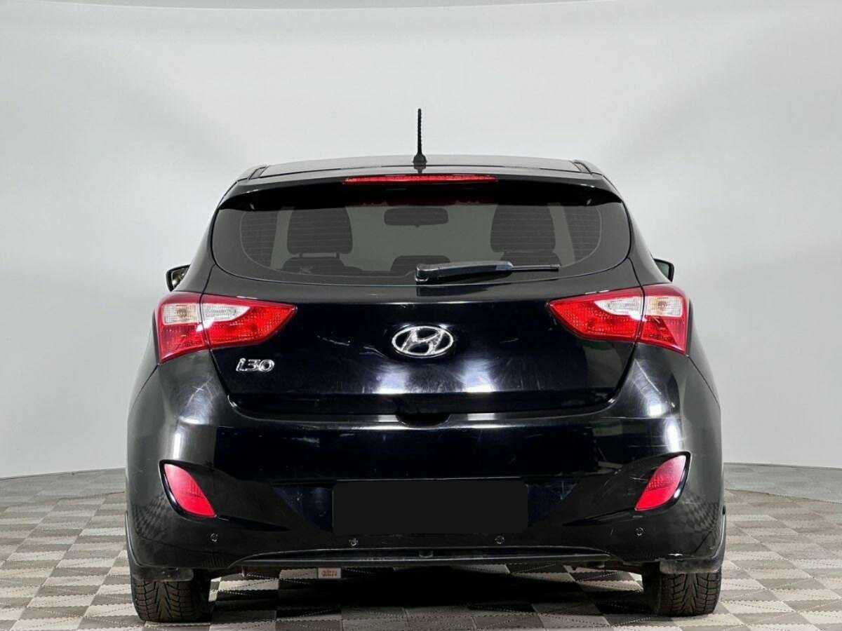 Hyundai i30 2014 года с пробегом. Фото: #3