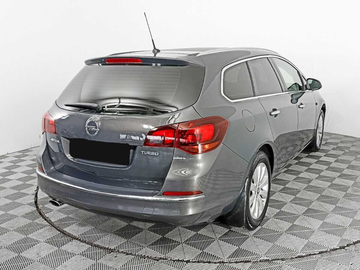 Б/У Опель Астра 2013 года. Фото: #4