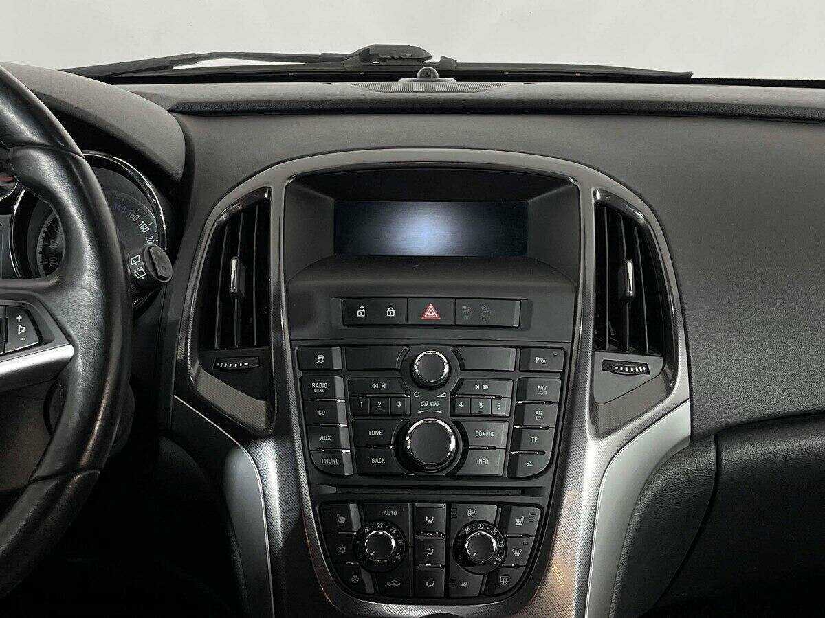 Б/У Опель Астра 2012 года. Фото: #11