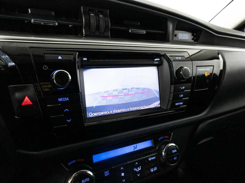 Б/У Тойота Королла 2014 года. Фото: #14