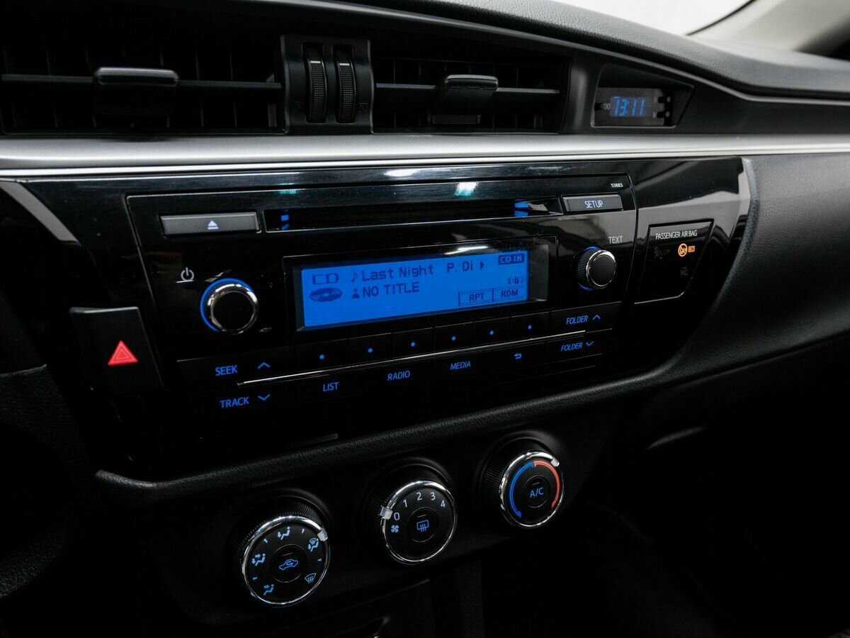 Б/У Тойота Королла 2015 года. Фото: #19