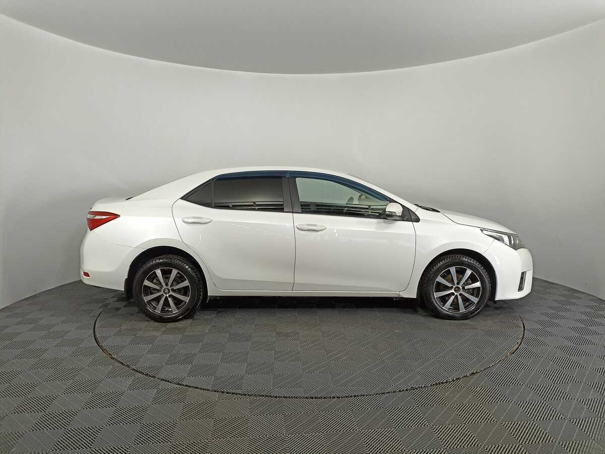 Б/У Тойота Королла 2013 года. Фото: #3