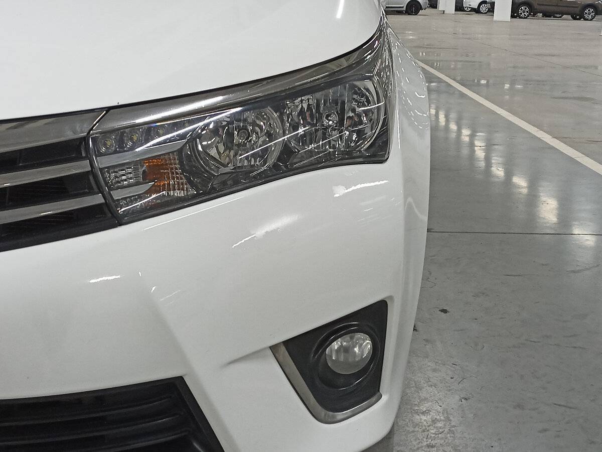 Б/У Тойота Королла 2013 года. Фото: #16