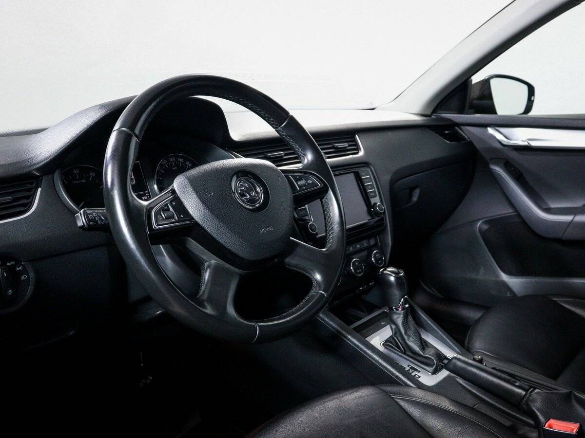 Б/У Шкода Октавия 2014 года. Фото: #13