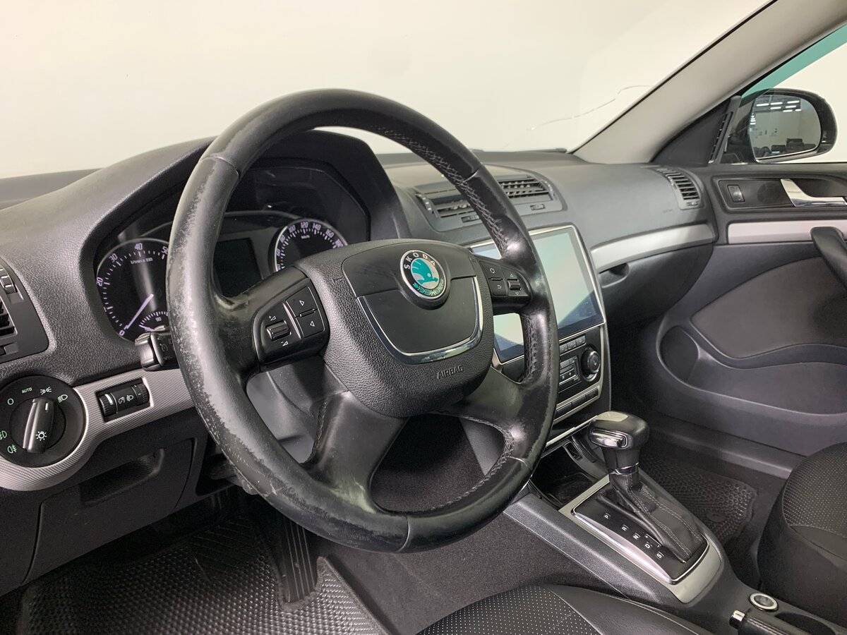 Б/У Шкода Октавия 2012 года. Фото: #10