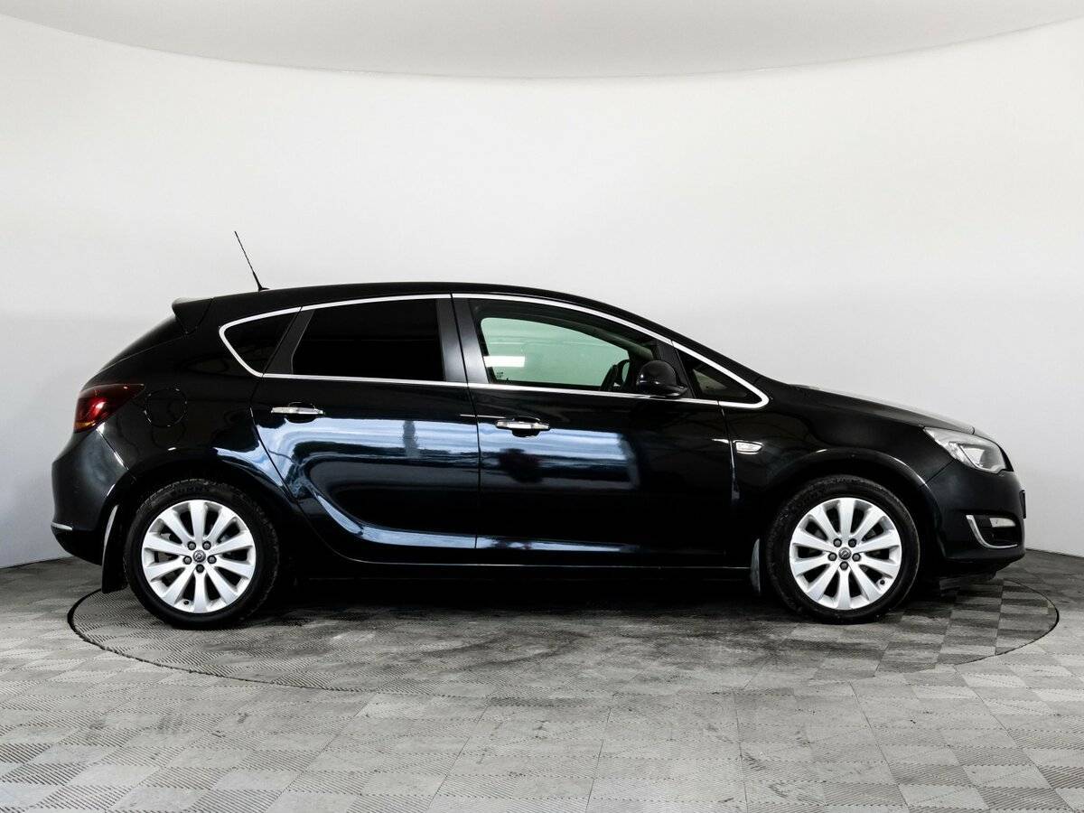 Б/У Опель Астра 2012 года. Фото: #3