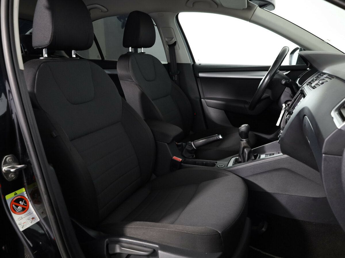 Б/У Шкода Октавия 2013 года. Фото: #11