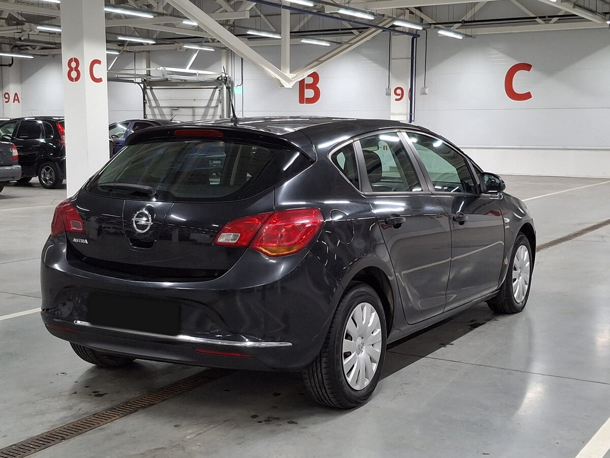 Б/У Опель Астра 2013 года. Фото: #4