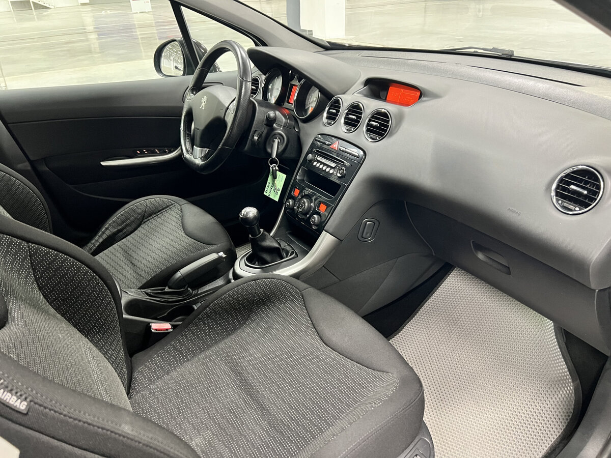 Б/У Пежо 308 2012 года. Фото: #10